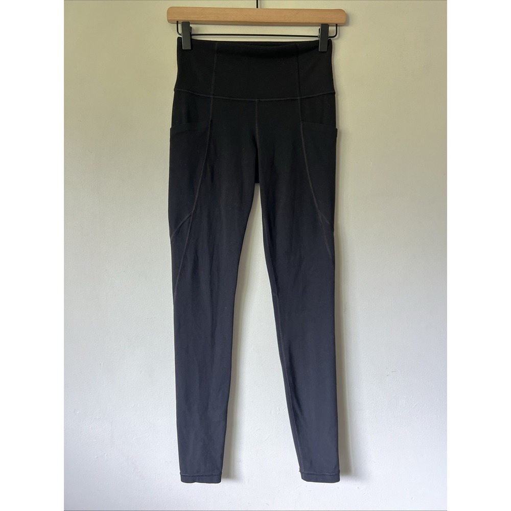 Athleta Salutation Stash Pocket Tight Size XS in Solid Black
